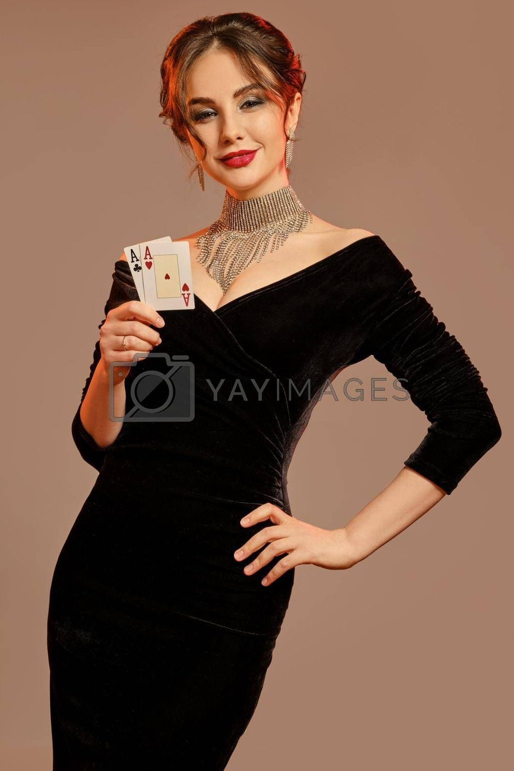 Brunette Model in Black Dress Holds Cards, Glows in Neon Elegance by nazarovserg 821
